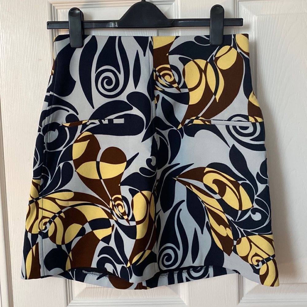 Zara light blue and yellow above the knee skirt with zipper closure